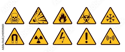 Warning signs. Realistic caution icons. Yellow and black stickers set. Danger of radiation or electricity. Flammable or toxic material. Vector symbols with exclamation mark and skull