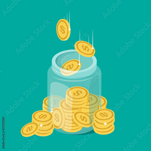Glass money jar full of gold coins