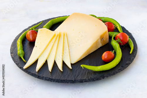 Kashar cheese or kashkaval cheese. Sliced Cheddar Cheese. gourmet cheese. local name trakya kaşar peyniri photo