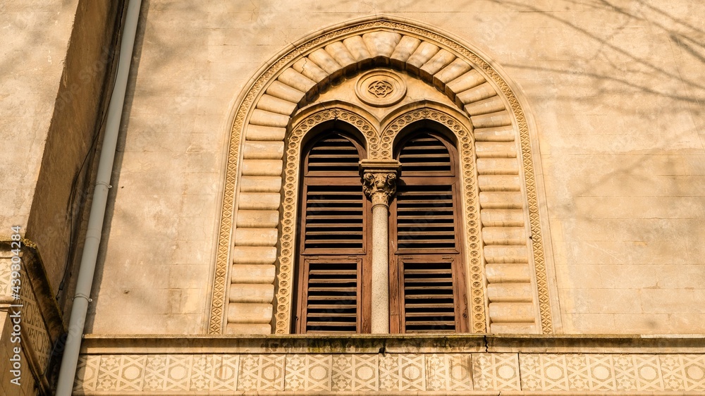 Details of a moorish style window, that strangely belongs to a building located in Rome.