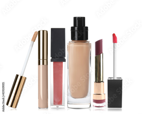 Set with different decorative cosmetics on white background