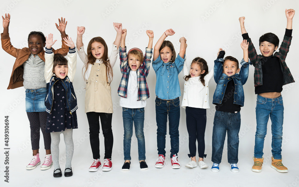 Fototapeta premium A group of primary schoolers cheering