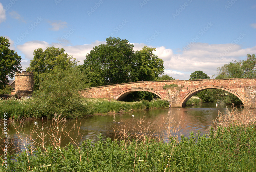 stone bridge and tower on river Tyne Haddington in summer stone bridge and tower on river Tyne Haddington in summer