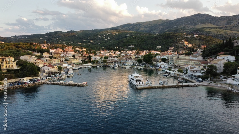 An Ariel drone shot of Kassiopi harbor, Greece, Corfu  