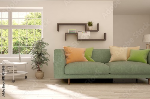 White living room with sofa and summer landscape in window. Scandinavian interior design. 3D illustration