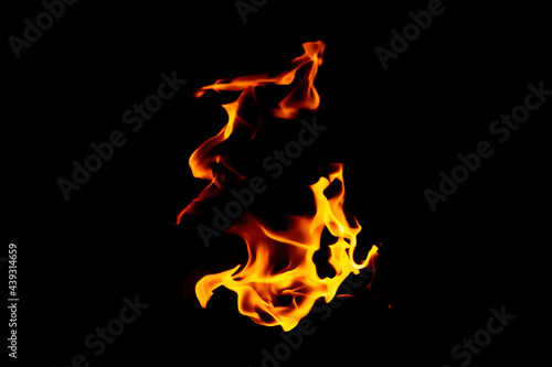 Real flames from underground gas isolated on black