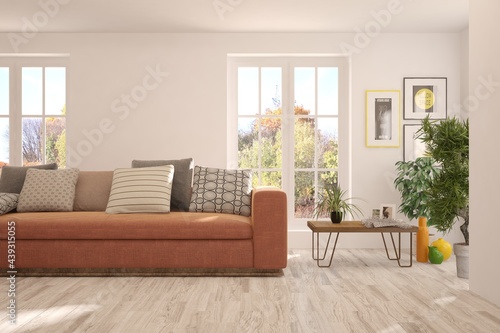 Stylish room in white color with sofa and autumn landscape in window. Scandinavian interior design. 3D illustration