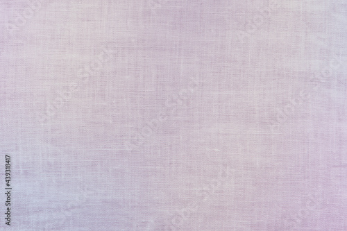 Linen texture background dyed in purple and lavender gradient