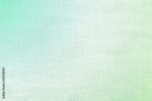Linen texture background dyed in green and white gradient