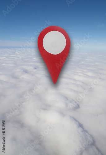 Aerial view of blue sky, clouds and horizon with a red locator