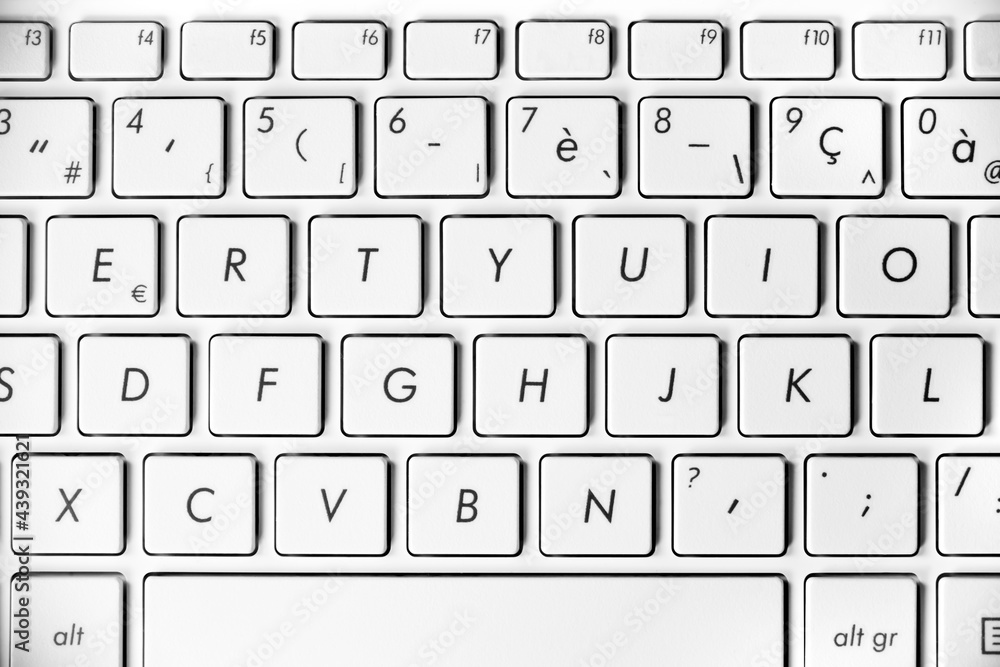 Close up of a computer white keyboard Close up of a computer white keyboard