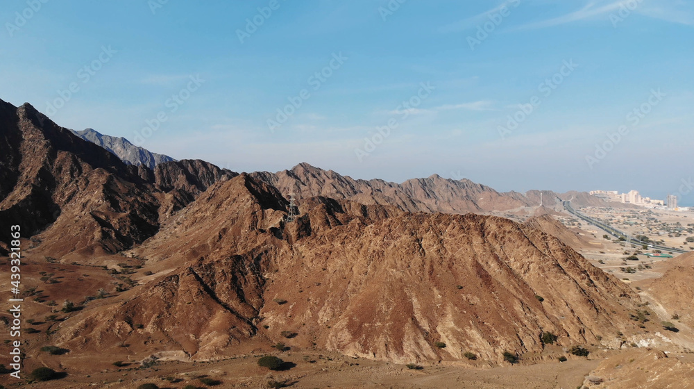 AERIAL. Top view of Road between mountains in UAE