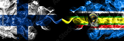 Finland, Finnish vs Organizations, East African Community smoky flags side by side.