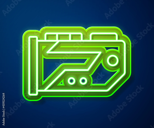 Glowing neon line Video graphic card icon isolated on blue background. Vector