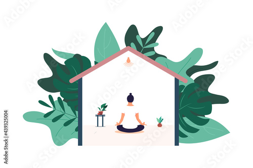 Woman doing yoga exercises at home on Quarantine with video lesson. Stay home, 2019-nCoV Novel Corona virus