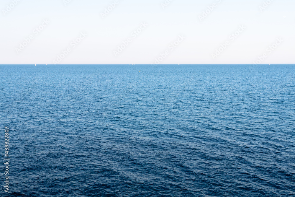 Fototapeta premium Mediterranean sea horizon captured in a sunny day in Barcelona, Spain.