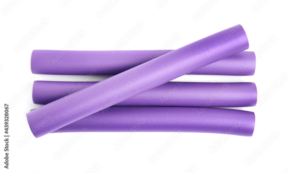 Curling rods isolated on white, top view. Hair styling tool Curling rods isolated on white, top view. Hair styling tool