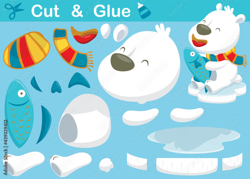 Funny polar bear cartoon wearing scarf while holding fish. Education paper game for children. Cutout and gluing