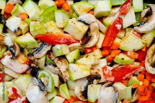 Fresh chopped vegetables and champignons. Healthy food and healthy lifestyle.
