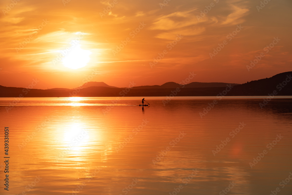 a sunset on Lake Balaton seen from the Balatonlelle city - Hungary