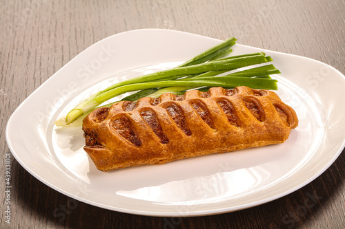 Tasty puff pastry with meat