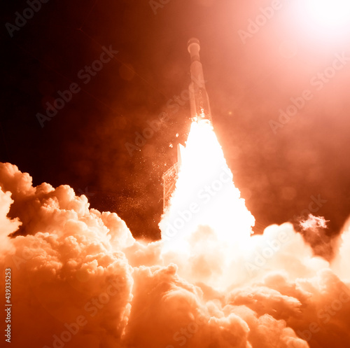 Cloudy rocket launch. The elements of this image furnished by NASA.