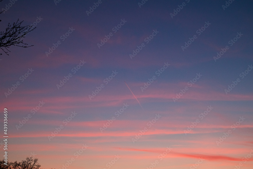 sunset sky with airplane
