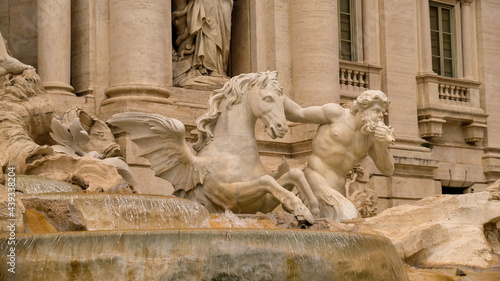 Rome. Detail of Trevi Fountain. A triton guide one of the two winged horses that pull Neptune's chariot.