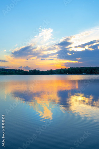 Fototapeta Naklejka Na Ścianę i Meble -  magnificent sunrise on the river bank in summer