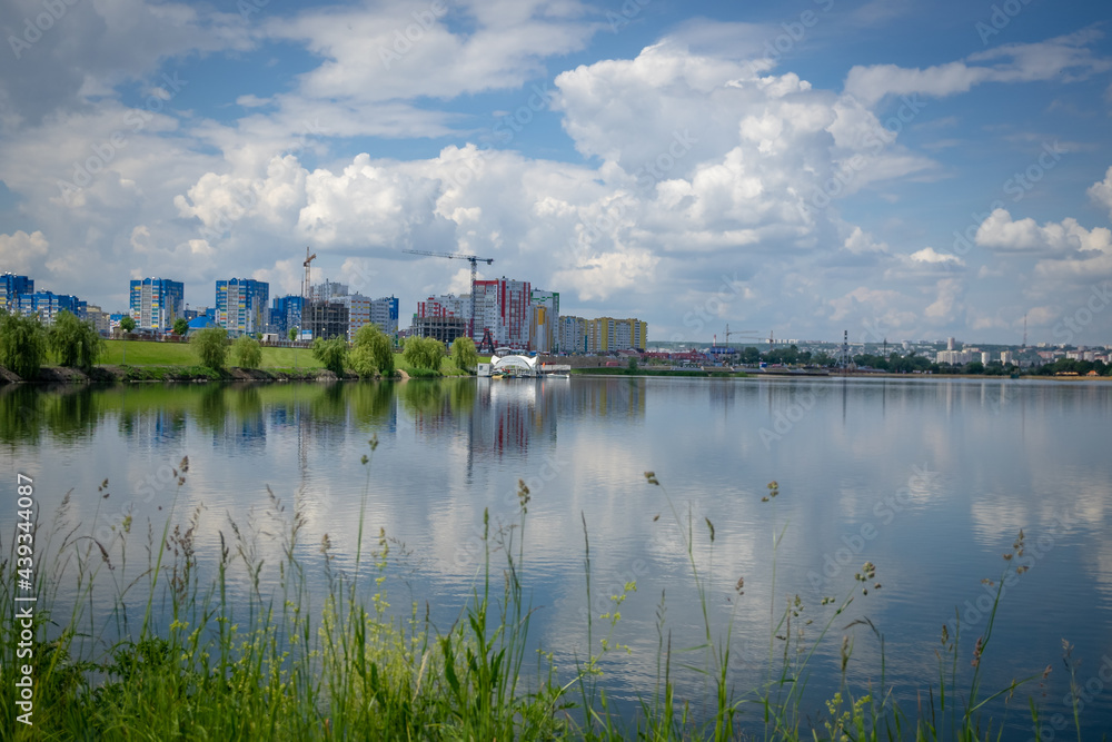 beautiful city on the shore of the lake, where there are fishermen