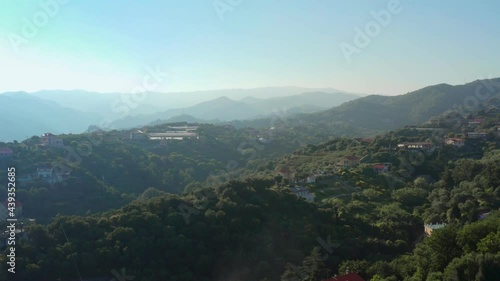 Aerial view of landscape in Garbasso, Celle Ligure comune, Savona province, regione Liguria region. Ligurian coastline with green hills. Drone 4k footage photo