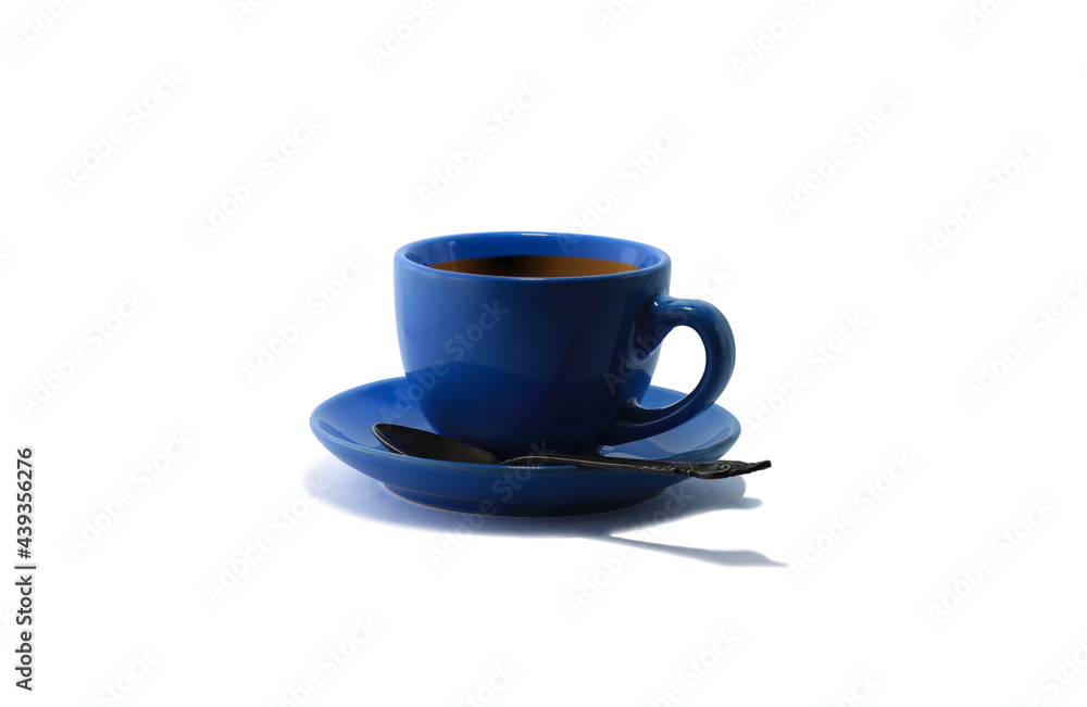 Blue tea cup and tea saucer with iron teaspoon isolated on white background Blue tea cup and tea saucer with iron teaspoon isolated on white background