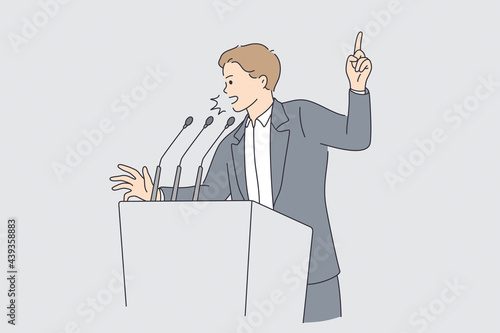Politics and election campaign concept. Young determined businessman or politician man cartoon character standing and making announcement or presentation from tribune showing finger up 