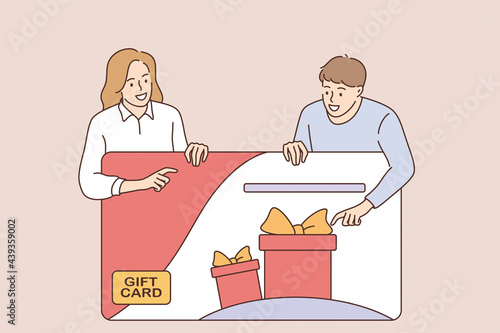 Customers gift card bonus concept. Cheerful happy people couple cartoon characters feeling happy about discount card, coupon or voucher during promotion vector illustration 