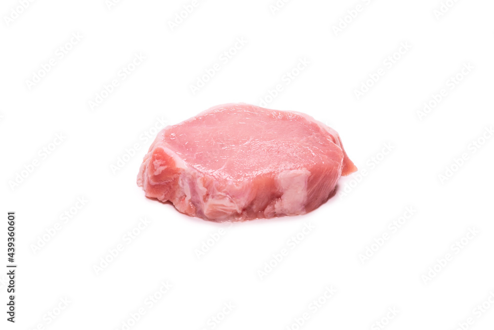 Raw pork pieces isolated on a white background.