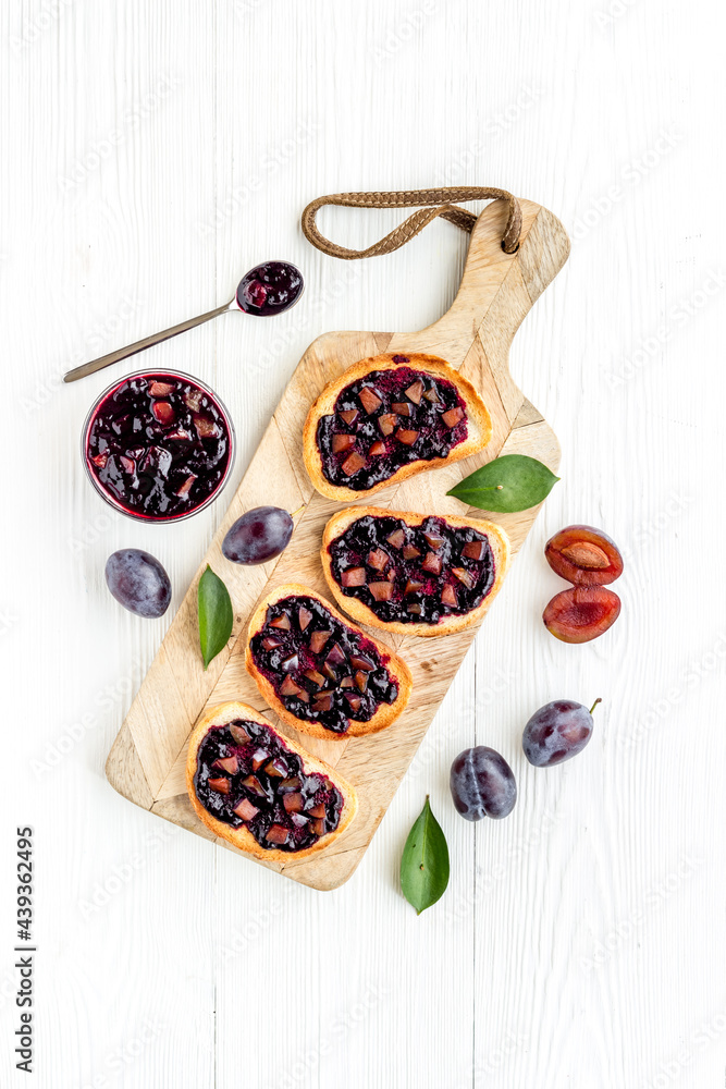 Food layout of toasted bread with plump jam Food layout of toasted bread with plump jam