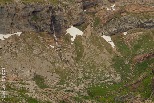 Pendiente rocosa en un lado del ibon de Estanes (ibon significa en aragones, un pequeño lago glaciar situado generalmente por encima de los 2000 metros). Se encuentra en el Pirineo de Huesca. photo