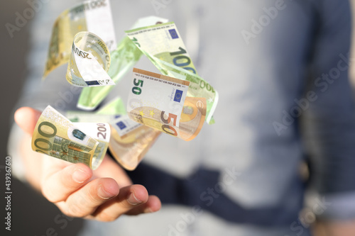 euro bills flying around  i...