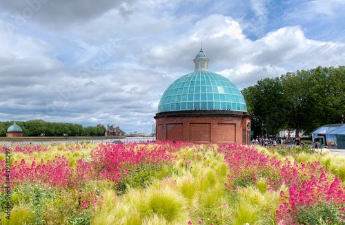 The famous foot tunnel dome architecture by the riverside of Thames river in London photo