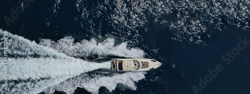 Wallpaper Mural Aerial drone ultra wide panoramic top down photo of small luxury yacht cruising open ocean deep blue sea Torontodigital.ca
