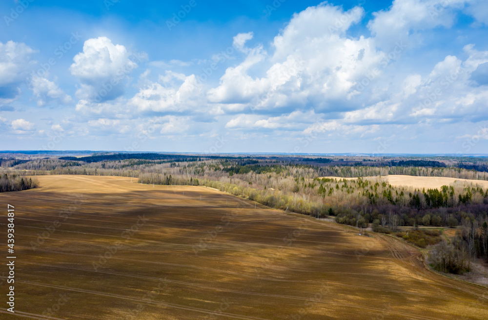 Aerial view of agricultural landscape with fields in spring season. Aerial view of agricultural landscape with fields in spring season.