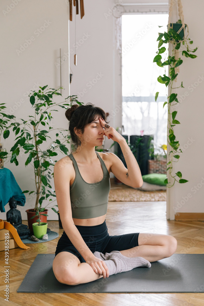 Young woman practice yoga at home Young woman practice yoga at home
