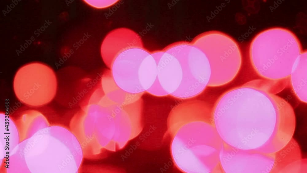 Defocused bokeh lights and lens flare, abstract light background.
Defocused bokeh lights and lens flare, abstract light background.