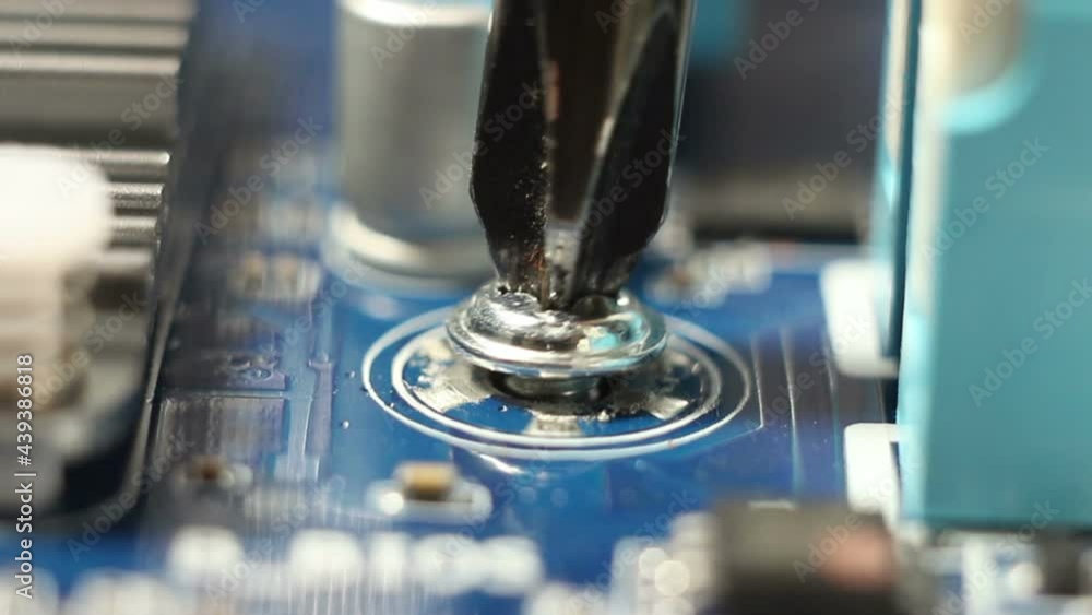 Mounting of screws at service center. Fixing of electronic components screws.
Mounting of screws at service center. Fixing of electronic components screws.