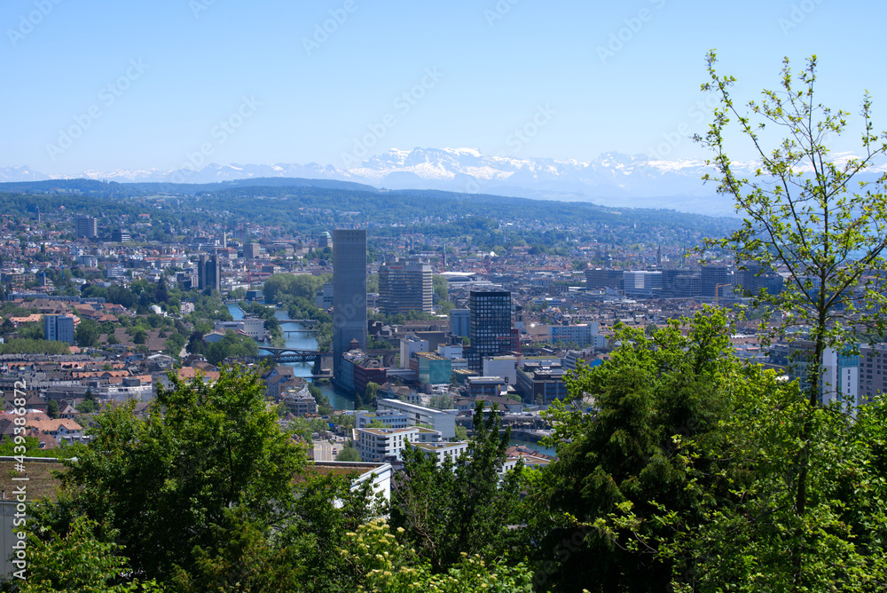 Obraz premium Panorama view over the City of Zurich with river Limmat and Swiss alps in the background at a beautiful summer day. Photo taken June 14th, 2021, Zurich, Switzerland.