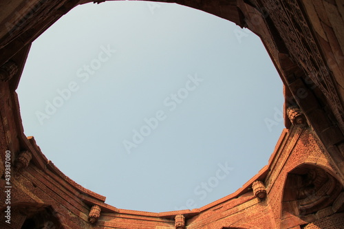 Mughal structure in qutub minar complex mehrauli, skylight, oculus, dome base, sandstone photo