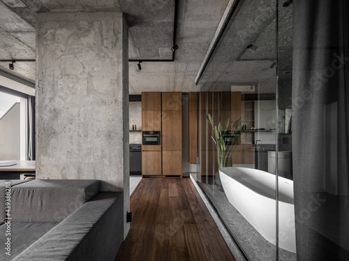 Interior in loft style with concrete elements photo