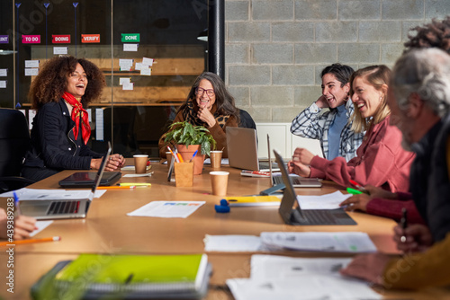 Business team laughing