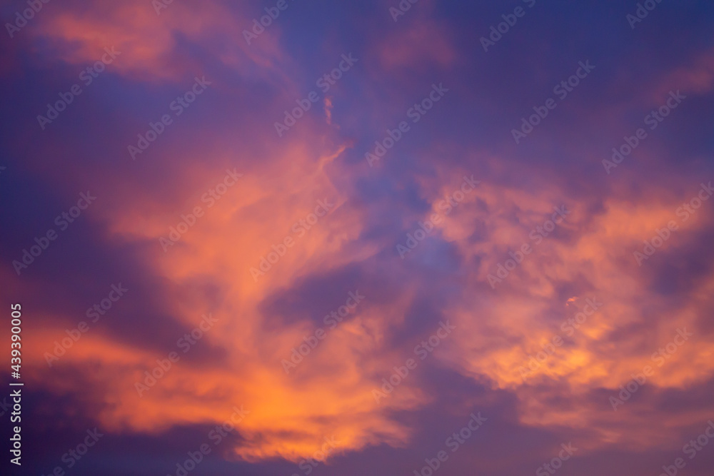 Orange sunset clouds, evening sky
