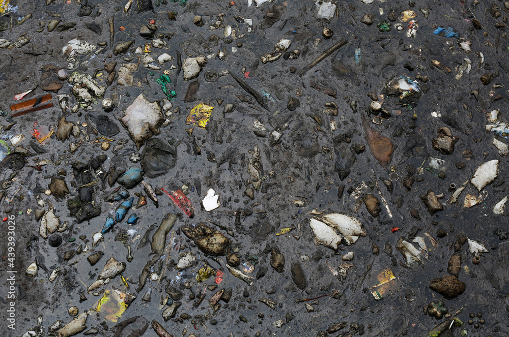 Aerial view of high quantities of trash inside a canal near Negro River, downtown Manaus, located in Amazonas state, Brazil. Aerial view of high quantities of trash inside a canal near Negro River, downtown Manaus, located in Amazonas state, Brazil.